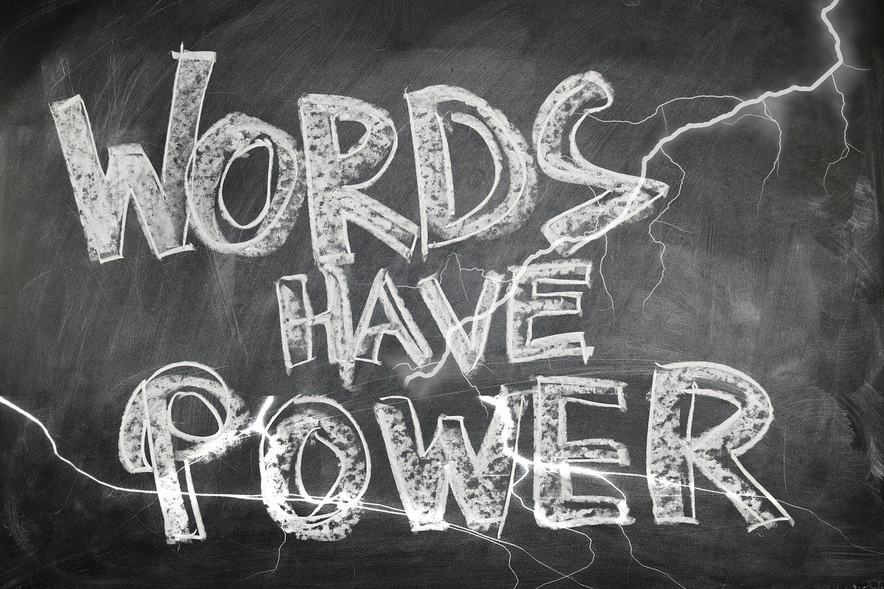 Argumentative Essay, Blackboard saying "Words Have Power," StudySmarter